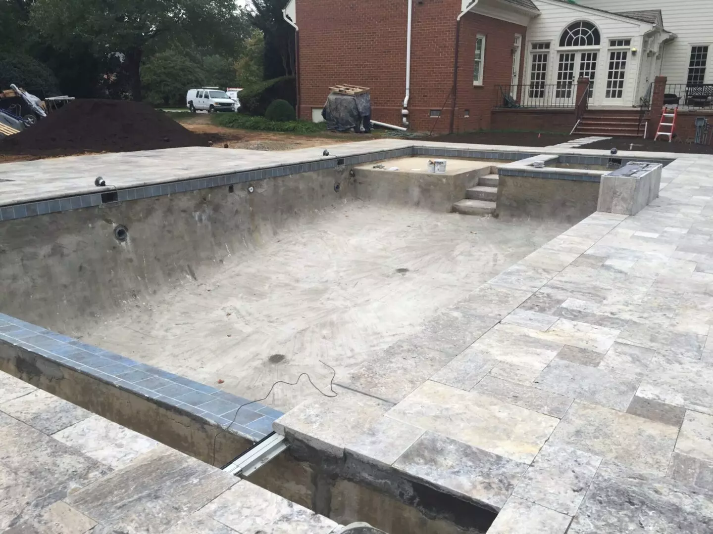 Laying Down Concrete on the Designated Pool Site